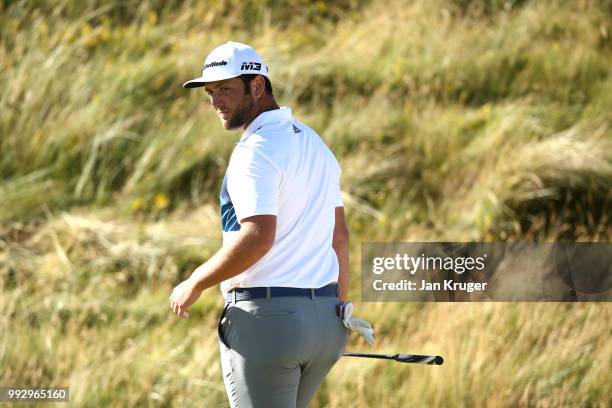 Jon Rahm of Spain inspects the 18th green during the second round of the Dubai Duty Free Irish Open at Ballyliffin Golf Club on July 6, 2018 in...