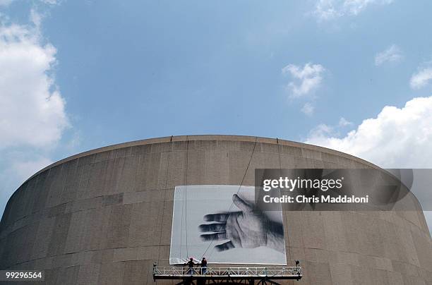 Unititled ," a billborad deisgned by aritst Felix Gonzalez-Torres is mounted on the facade of the Hirshhorn Museum. The billboard will also be...