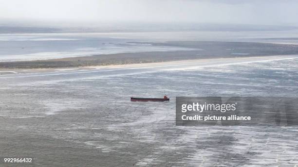 The cargo ship 'glory Amsterdam' is stranded in the German Bight in front of Langeoog, Germany, 30 October 2017. The storm 'Herwart' drifted the bulk...
