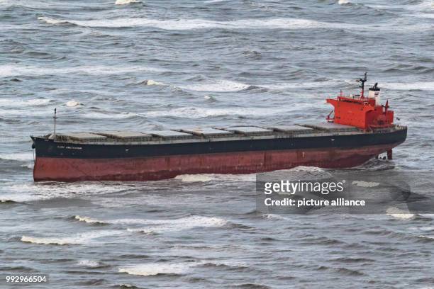 The cargo ship 'Glory Amsterdam' is stranded in the German Bight in front of Langeoog, Germany, 30 October 2017. The storm 'Herwart' drifted the bulk...