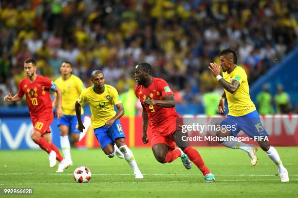 Romelu Lukaku of Belgium challenge for the ball with bra17a and Paulinho of Brazil during the 2018 FIFA World Cup Russia Quarter Final match between...