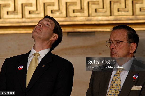 Bill Frist, R-TN., looks at ceiling during remarks about ceiling art during the dedication ceremony for the Statue of Dwight D. Eisenhower. Speaker...