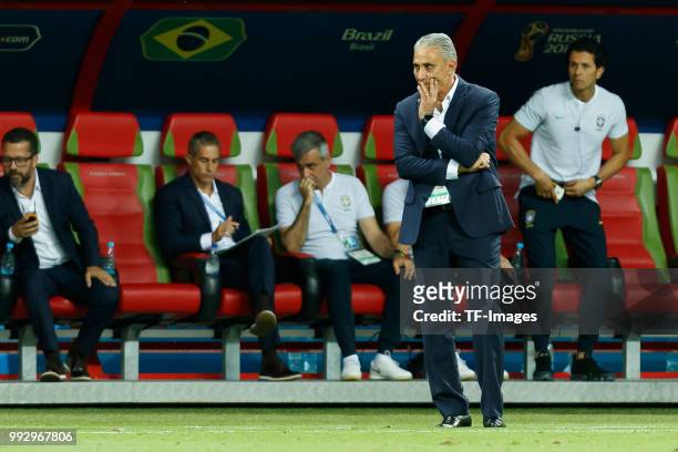 Coach Tite looks dejected following Belgium's second goal during the 2018 FIFA World Cup Russia Quarter Final match between Brazil and Belgium at...