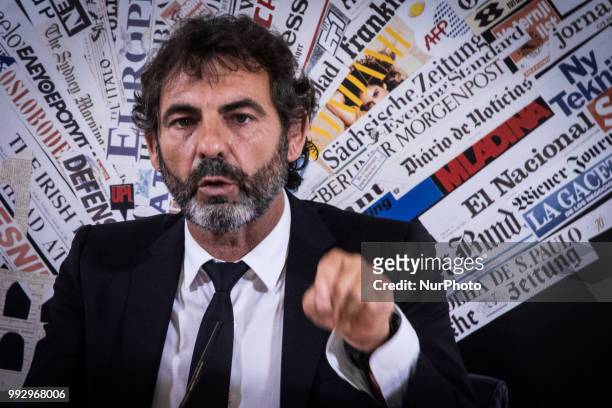 Oscar Camps, founder of Proactiva Open Arms, a Spanish NGO which specialized in search and rescue operations at sea, talks to reporters during a...