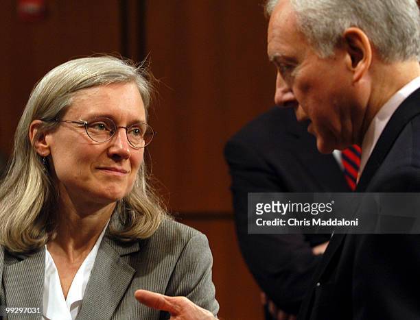 Chairman Orrin Hatch, R-Utah, talking to witness Dr. Laura Welch, Medical Director of the Center to Portect Worker's Rights, before a Judicary...
