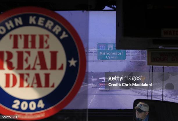 Democratic presidential candidate Sen. John Kerry's press bus follos his bus after a chili lunch in an Elks Lodge in Laconia, New Hampshire.