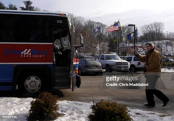 Democratic presidential candidate Sen. John Kerry leaves his hotel to go to his first stop, a chili lunch in a Elks Lodge in Laconia, New Hampshire.