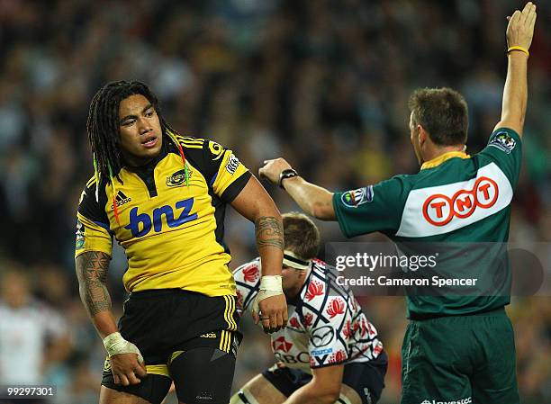 Referee Chris Pollock talks to Ma'a Nonu of the Hurricanes during the round 14 Super 14 match between the Waratahs and the Hurricanes at Sydney...