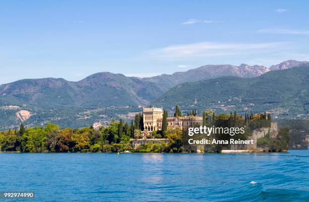 isola del garda with villa borghese cavazza, isola del garda, lake garda, northern italy, italy - isola stock pictures, royalty-free photos & images