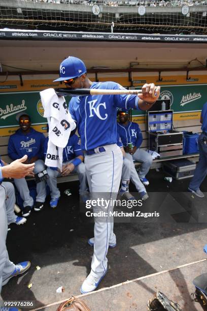 Alcides Escobar of the Kansas City Royals kisses his bat in the dugout prior to the game against the Oakland Athletics at the Oakland Alameda...