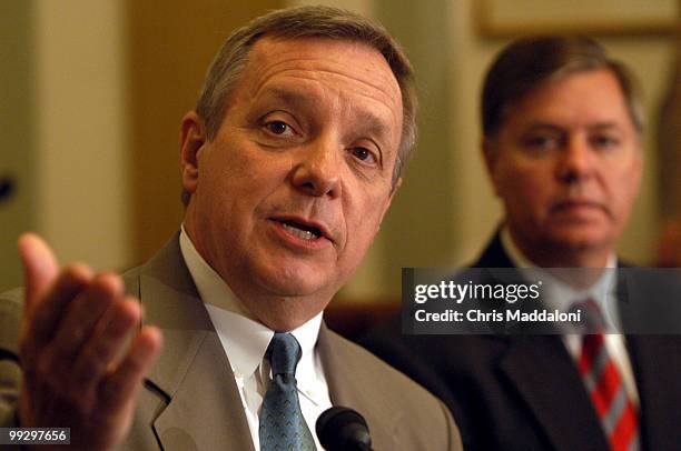 Sen. Dick Durban, D-Ill, with Sen. Lindsey Graham, R-SC, speaks at a press conference in support of their alternative to the medical malpractice bill.