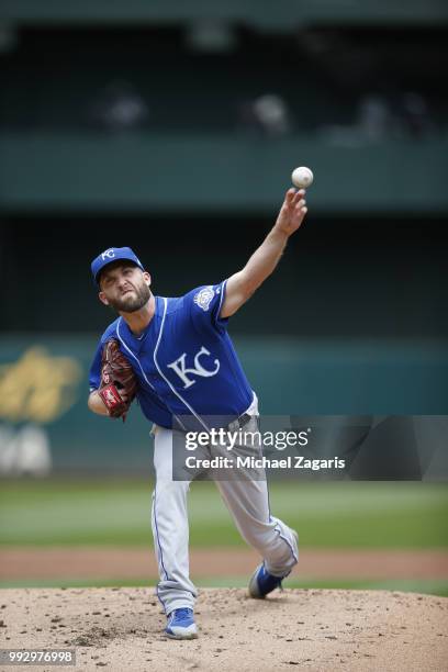 Danny Duffy of the Kansas City Royals pitches during the game against the Oakland Athletics at the Oakland Alameda Coliseum on June 9, 2018 in...