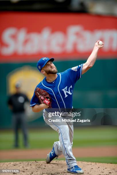 Danny Duffy of the Kansas City Royals pitches during the game against the Oakland Athletics at the Oakland Alameda Coliseum on June 9, 2018 in...