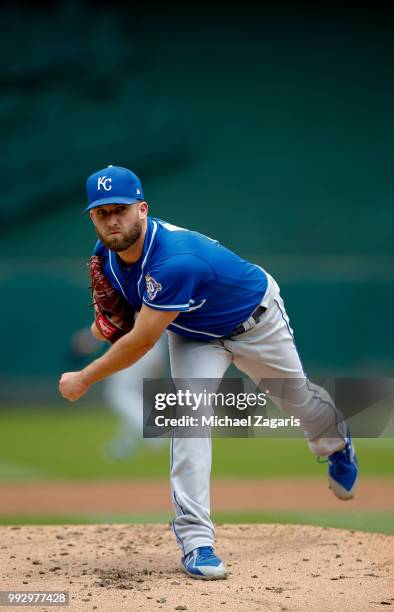 Danny Duffy of the Kansas City Royals pitches during the game against the Oakland Athletics at the Oakland Alameda Coliseum on June 9, 2018 in...