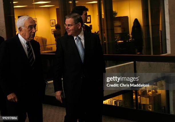 Sen. Frank Lautenberg, D-NJ, escorts newly appointed Sen. Bob Menendez, D-NJ, from his Hart office to the Senate floor for his swearing-in.