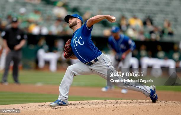 Danny Duffy of the Kansas City Royals pitches during the game against the Oakland Athletics at the Oakland Alameda Coliseum on June 9, 2018 in...