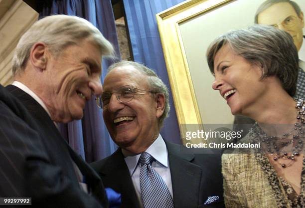 Fmr. Sen. George Mitchell, D-Me., with his wife Heather, share a laugh with Sen. John Warner, R-Va., at Mitchell's portrait unveiling in the Old...