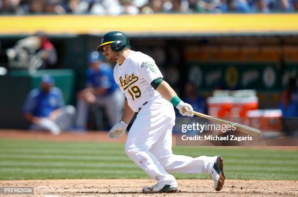 Josh Phegley of the Oakland Athletics bats during the game against the Kansas City Royals at the Oakland Alameda Coliseum on June 9, 2018 in Oakland,...