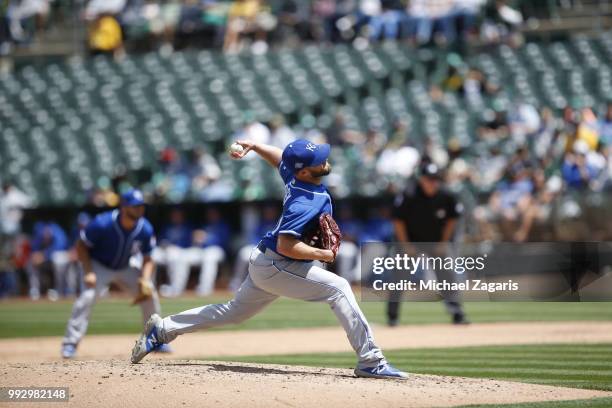 Danny Duffy of the Kansas City Royals pitches during the game against the Oakland Athletics at the Oakland Alameda Coliseum on June 9, 2018 in...