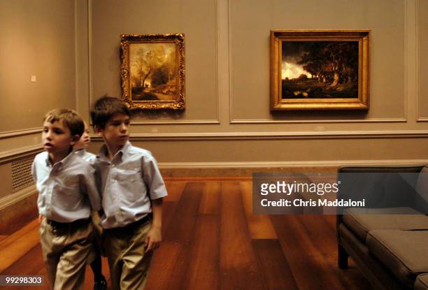 Children from Herndon's Ambleside School tour the early 19th century French gallery at the National Gallery of Art.