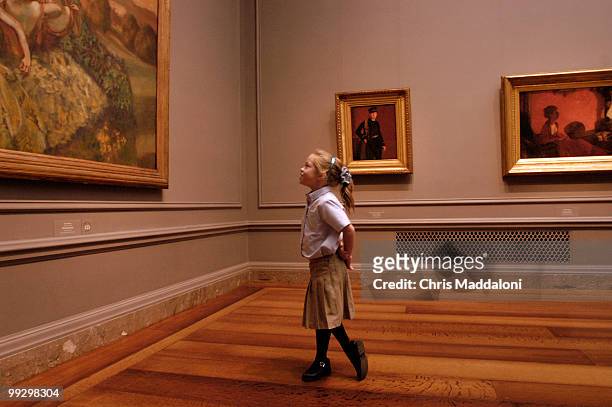 Girl from Herndon's Ambleside School looks at Edgar Degas' Four Dancers at the National Gallery of Art.