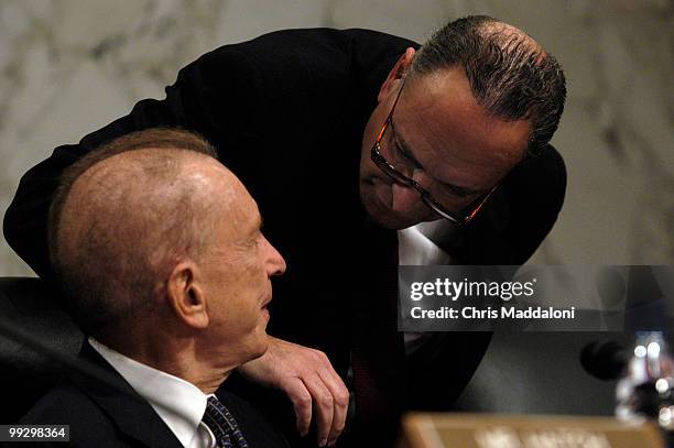 Sen. Arlen Specter, R-Pa., speaks with Sen. Charles Schumer, D-NY, at a Senate Judiciary Committee hearing on PATRIOT Act Oversight.