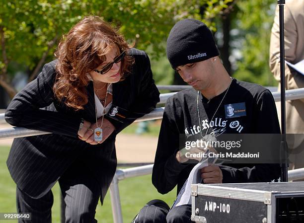 Actress Susan Sarandon speaks to "Life Rolls On" founder Jesse Billauer before a a Christopher Reeve Foundation "Working 2 Walk Rally," held in honor...