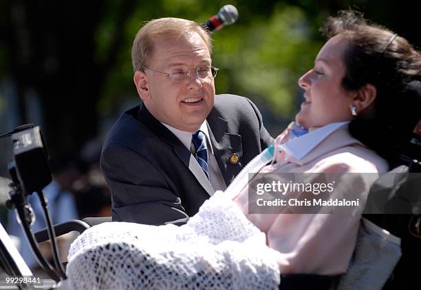 Rep. Jim Langevin, D-RI, speaks with New York State Senate candidate Brooke Ellison at a Christopher Reeve Foundation "Working 2 Walk Rally," held in...