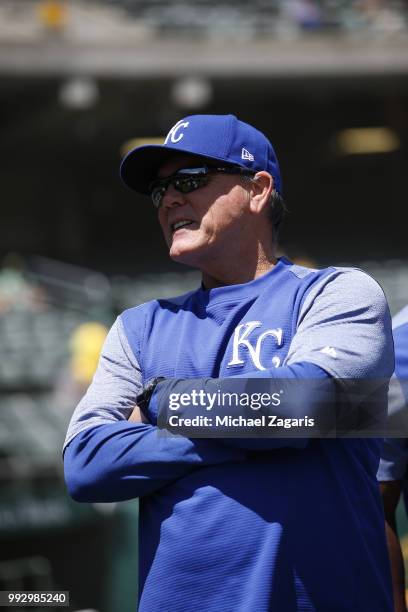 Manager Ned Yost of the Kansas City Royals stands on the field prior to the game against the Oakland Athletics at the Oakland Alameda Coliseum on...