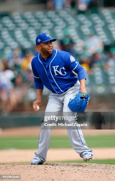 Kelvin Herrera of the Kansas City Royals pitches during the game against the Oakland Athletics at the Oakland Alameda Coliseum on June 9, 2018 in...