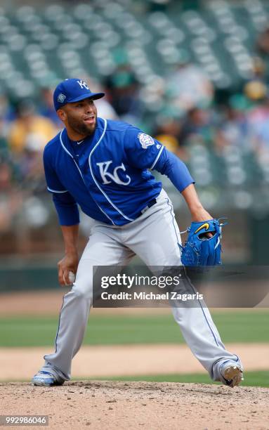 Kelvin Herrera of the Kansas City Royals pitches during the game against the Oakland Athletics at the Oakland Alameda Coliseum on June 9, 2018 in...