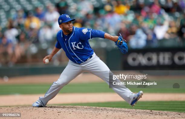 Kelvin Herrera of the Kansas City Royals pitches during the game against the Oakland Athletics at the Oakland Alameda Coliseum on June 9, 2018 in...