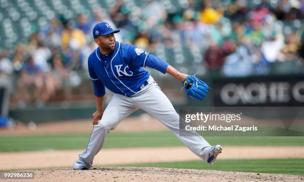 Kelvin Herrera of the Kansas City Royals pitches during the game against the Oakland Athletics at the Oakland Alameda Coliseum on June 9, 2018 in...