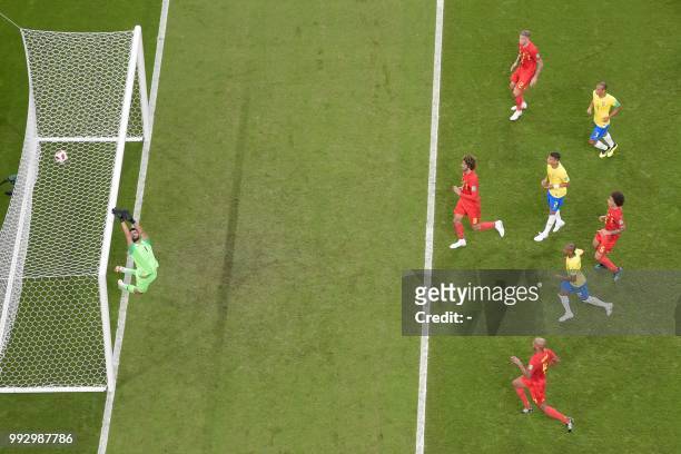 Brazil's goalkeeper Alisson pushes the ball over the bar during the Russia 2018 World Cup quarter-final football match between Brazil and Belgium at...