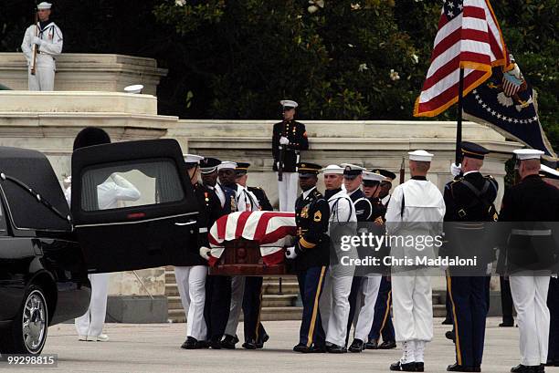 The casket of former president Ronald Reagan is removed from lying in state in the Rotunda of the Capitol.