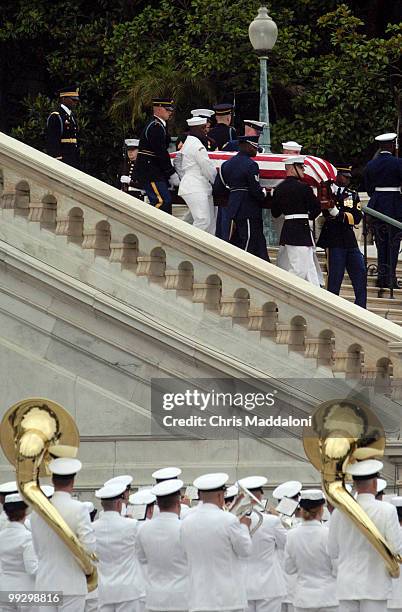 The casket of former president Ronald Reagan is removed from lying in state in the Rotunda of the Capitol.