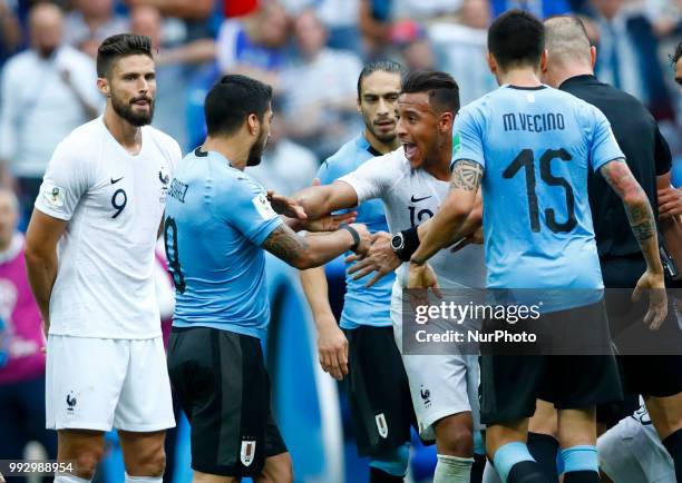 France v Uruguay - Quarter-finals FIFA World Cup Russia 2018 Luis Suarez and Corentin Tolisso during a discussion between the two teams after a foul...