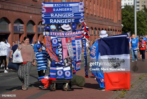 Rangers merchandise bearing the name and face of Ranger new manager Steven Gerrard on display outside Ibrox Stadium during the Pre-Season Friendly...