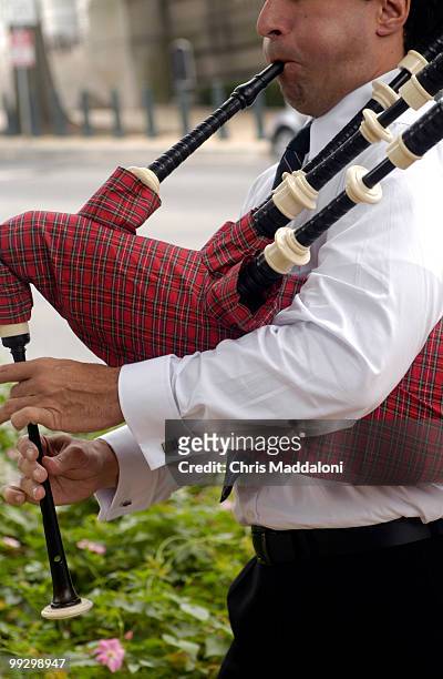Todd Wilson, an economist at the Bureau of Labor Statistics, plays the bagpipes at the U.S. Capitol Page Reunion of the 1952-1959 classes. They...