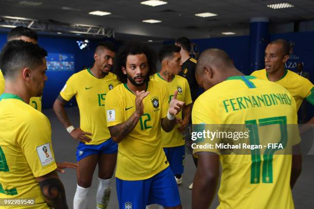 Marcelo of Brazil speaks with team mates in the tunnel ahead of the second half during the 2018 FIFA World Cup Russia Quarter Final match between...