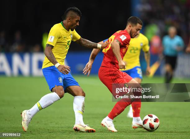 Eden Hazard of Belgium is challenged by Paulinho of Brazil during the 2018 FIFA World Cup Russia Quarter Final match between Brazil and Belgium at...