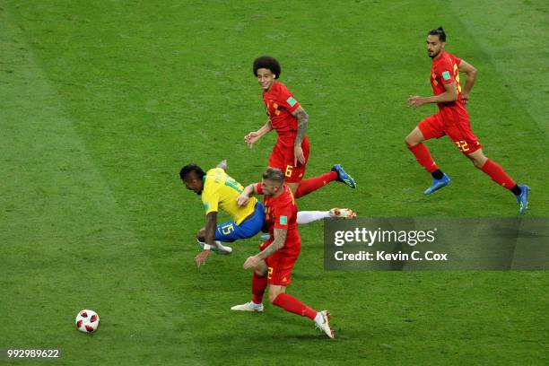 Paulinho of Brazil is challenged by Axel Witsel, Toby Alderweireld and Nacer Chadli of Belgium during the 2018 FIFA World Cup Russia Quarter Final...