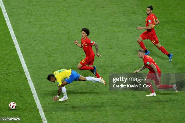 Paulinho of Brazil is challenged by Axel Witsel, Toby Alderweireld and Nacer Chadli of Belgium during the 2018 FIFA World Cup Russia Quarter Final...