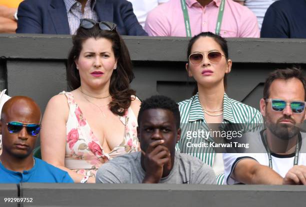 Cara McConnell and Olivia Munn attend day five of the Wimbledon Tennis Championships at the All England Lawn Tennis and Croquet Club on July 6, 2018...