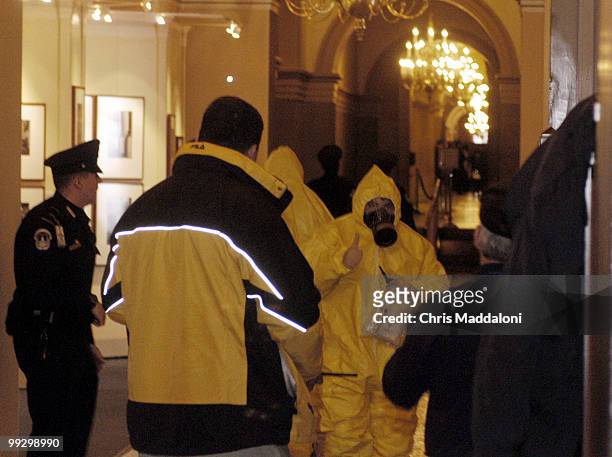 Capitol Police put on hazmat suits to sweep the Capitol. Last night ricin was found in one of the mailrooms on the Senate. Here a member of the...