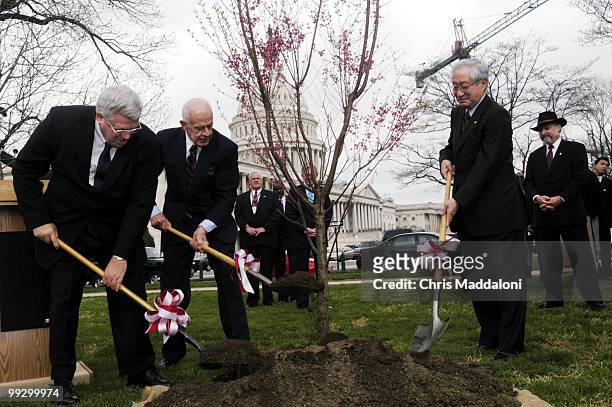 Speaker of the House Dennis Hastert, R-Il., helps dedicate the "First Lady" cherry tree to commemorate 150 years of U.S.-Japanese Relations, with...