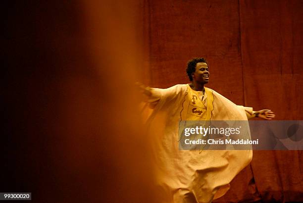 The Children of Uganda's Artistic Director Peter Kasule leads audience participation with local elementary school kids at the Atlas Performing Arts...