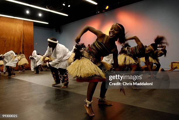 The Children of Uganda perform for local elementary school kids at the Atlas Performing Arts Center on the H St. NE corridor. The Children of Uganda,...