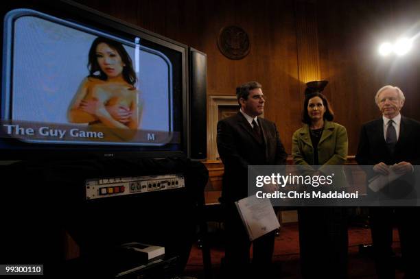 Sen. Joseph Lieberman, D-Ct. , at a annual press conference "Video Game Report Card," with Rep. Betty McCollum, D-Mn. , and Steven Kent, a video game...