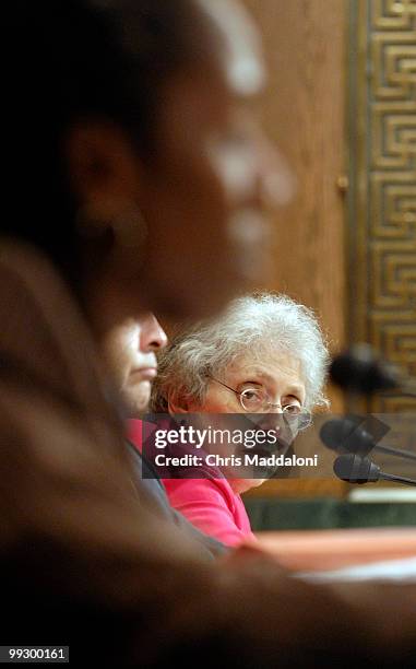 Abigail Thernstrom, vice chairman, U.S. Commission on Civil Rights, watches Sherrilyn Ifill, associate professor of law, University of Maryland Law...